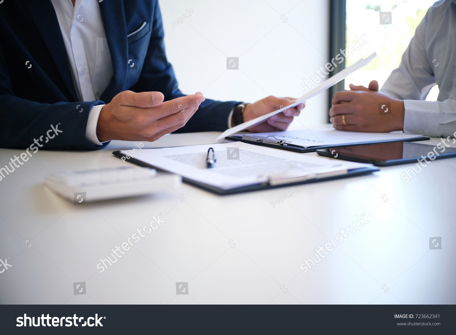 Stock Photo Sales Manager Giving Advice Application Form Document Considering Mortgage Loan Offer For Car And 723662341